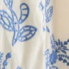 Vest i bomull med blomsterbroderi