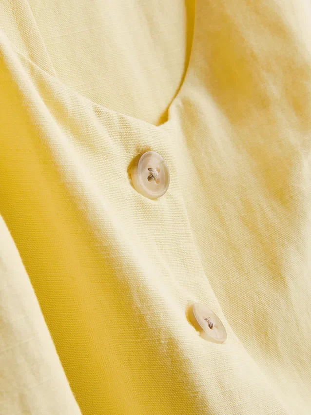Vest i bomullsblanding med knapper